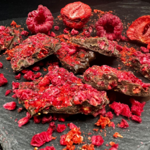 Fruits and berries in dark chocolate